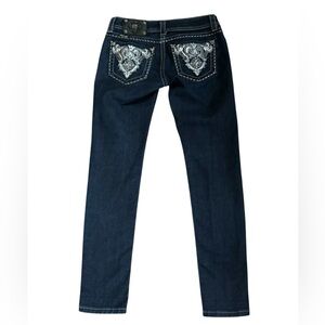 Miss Me Dark Wash Skinny Jeans with white stitching and bling. Size 27